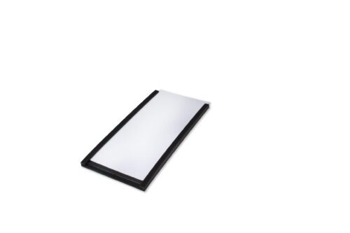 A rectangular black solar panel with a white surface sits at an angle on a white background, mirroring the sleek design of the MH-USA Magnetic Label Holder measuring H.1.57 in. x W.3.15 in., sold in packs of 100.