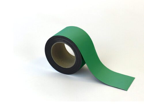 An unrolled MH-USA Magnetic Easy-Wipe Strip - Green - H.2.76 in. x W3.94 in., reveals its black underside on a white surface, with the pale brown inner core enhancing its green exterior.