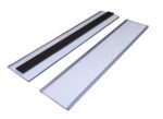 Two rectangular magnetic bars with white surfaces and black strips; the left shows the strip, and the right a plain surface. Both have a sleek, slightly reflective design similar to an MH-USA Magnetic Ticket Holder (H.1.5 in. x W.7.87 in., Pack of 50, Including Card).
