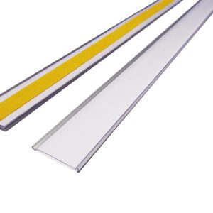 Two elongated rectangular strips, one clear and one with a yellow stripe, are set against a white background. They capture the sleek design of the MH-USA Self-Adhesive Ticket Holder - H.1.5 in. x W3.94 in. - Pack of 10 - Including Card, showcasing elegance in parallel alignment.