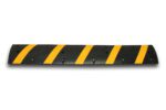 The TCT 5-10 MPH Speed Bump is black, measures 12 wide x 72 long x 2 tall, and includes five diagonal yellow stripes on a white background.