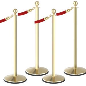 Four Visiontron Prime Ball Top Stanchion Bundles with red ropes form a zigzag pattern, hooking onto polished gold poles to create an elegant barrier against a crisp white background.