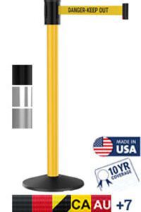 A yellow Premium Outdoor Visiontron Retractable Belt Post with a 15 belt reading DANGER-KEEP OUT features a black base with country code icons for CA, AU, and +7. It has a prominent Made in USA badge and a 10 Year Coverage emblem.