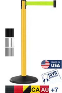 A Premium Outdoor Visiontron Retractable Belt Post is yellow with a black base, and a 10 green belt. It includes samples (black, gray, silver), has logos indicating USA manufacture, offers a 10-year warranty, shows flags of CA and AU, and comes with a sign.
