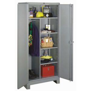 A gray metal storage cabinet with an open door, revealing five shelves. Items include a yellow hard hat, black flashlight, green safety vest, red toolbox, boots, and various cans and tools. A dark jacket hangs on the left side.