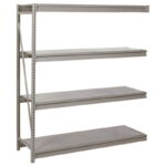 A metal shelving unit with four empty horizontal shelves. The shelves are supported by vertical beams on the left side and appear sturdy and industrial. The unit is gray in color.