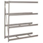 Industrial metal shelving with four levels. The frame is made of vertical beams with horizontal shelves that appear sturdy and suitable for heavy-duty storage. The structure is shown from an angle, highlighting its empty, open design.