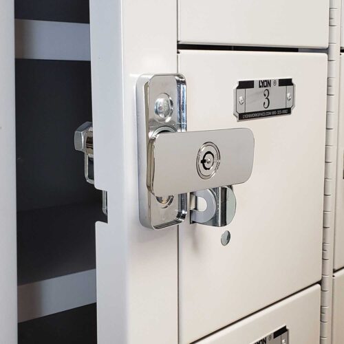 A white locker with a partially open door, featuring a silver lock with a keyhole and an extended latch. The locker door is marked with the number 3 on a metal plate.