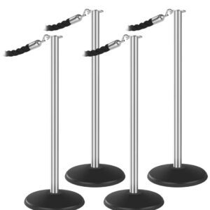 Four silver stanchions with black bases from the Visiontron Outdoor ST600 Series Flat Top Bundle are linked by black ropes with clips in a rectangular setup.