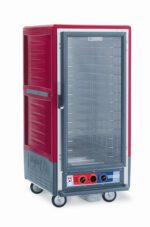 The Metro C537-MFC-4 C5 3 Series Cabinet, in red, features a clear full-length door with fixed wire slides and is mobile on wheels. It efficiently operates at 60Hz, running on 2000W power.