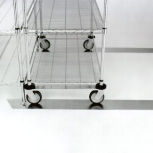 A black and white image shows a 6 metal wire shelf unit with four caster wheels on a smooth floor. The empty shelf is in a minimalist setting, featuring Metro FPS6N Top-Track Floor Pad Protectors for surface protection.
