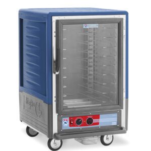 The Metro C535-HFC-U-BU C5 3 Series Insulated Holding Cabinet, featuring a blue exterior and full-length clear door, is mobile on wheels with universal wire slides and a vibrant control panel for 60Hz adjustments.