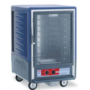 The Metro C535-HFC-L-BU C5 3 Series Insulated Holding Cabinet features a 1/2 height full-length clear door, blue sides, a red control panel at the bottom, runs on 120V power, and includes lip load aluminum slides for easy mobility with its four caster wheels.