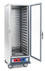 The Metro C519-CFC-LA C5 1 Series Holding/Proofing Cabinet, full height with lip load aluminum slides, has a transparent door, multiple shelves, bottom control dials, and runs on 120V/2000W. It features four wheels for easy mobility.