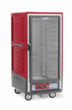 The Metro C537-HXFC-U C5 3 Series Insulated Holding Cabinet features a full-length clear door, universal wire slides, and bottom control knobs. This 3/4 height mobile unit has a red exterior and multiple shelves for easy use.