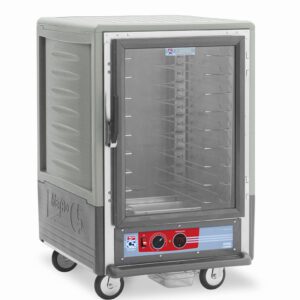 The Metro C535-HLFC-U-GY C5 3 Series Insulated Holding Cabinet is a sleek, 1/2 height unit on wheels featuring a full-length clear door with universal wire slides and a control panel with dials. It operates efficiently on 120V, blending metallic and gray surfaces.