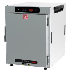 The Metro HBCW8-DS-CT HotBlox is a silver, rectangular warming cabinet with a digital touchscreen on top and the Hot Blox logo. It operates at 120V, 60Hz, 875W, includes a side handle, and fits stylishly on any flat surface.