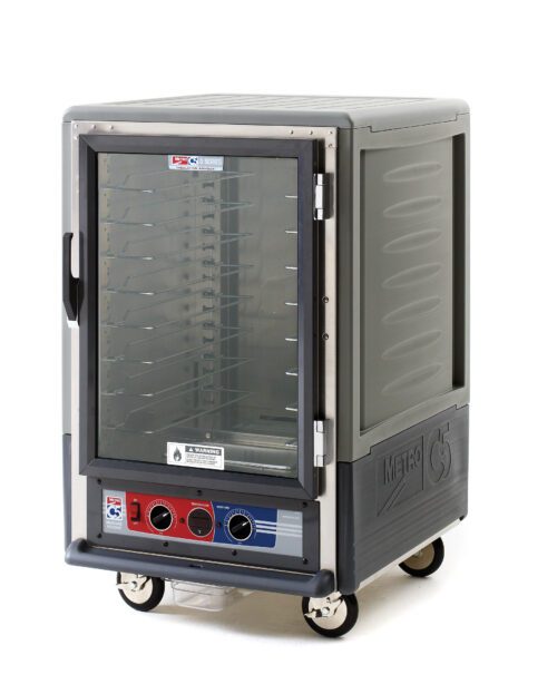 The Metro C535-MXFC-U-GY C5 3 Series Insulated Moisture Heated Holding/Proofing Cabinet, featuring a full-length clear door and universal wire slides, showcases a gray design with wheels for mobility and bottom control knobs for temperature settings. It operates on 220-240V, 50/60Hz, 1681-2000W.