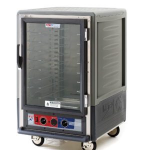The Metro C535-MXFC-U-GYA is a 1/2 height insulated moisture heated holding/proofing cabinet with a full-length clear door, universal wire slides, and operates at 220-240V, 50/60Hz. It features control knobs, mobility wheels, and a gray finish with branding on the bottom panel.