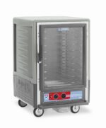 The Metro C535-HFC-U-GYA C5 3 Series is a 1/2 height insulated holding cabinet with a full-length clear door and universal wire slides. It operates at 120V, 60Hz, and 2000W, with bottom-mounted controls and four wheels for easy transport.