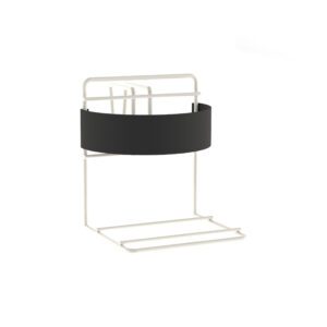A modern, minimalist white metal magazine rack with a central black sling mirrors the sleek design of the Metro FL584 Sharps Container Bracket for Flexline and Starsys Carts, boasting clean lines and an open frame perfect for displaying magazines or newspapers on a plain white background.