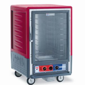 The Metro C535-MXFC-LA C5 3 Series is a red and gray commercial food warmer with a full-length clear door, featuring Lip Load Aluminum Slides. It operates at 220-240V, with control knobs at the bottom and four wheels for mobility.