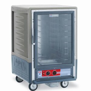 The Metro C535-HFC-L-GY C5 3 Series Holding Cabinet is a mobile, half-height unit with a full-length clear door and lip load aluminum slides. It features control knobs at the base, sturdy metal frame, and four wheels for easy mobility. Specifications: 120V, 60Hz, 2000W, Gray.