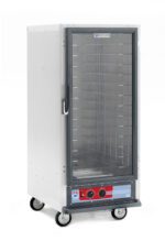 The Metro C517-HFC-4A C5 1 Series 3/4 Height Holding Cabinet is a mobile stainless steel food warmer with fixed wire slides and a clear door. Its bottom control panel offers adjustable settings and a digital display, operating efficiently at 120V, 60Hz, and 2000W.