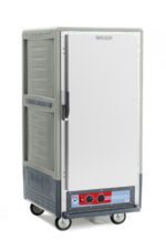 The Metro C537-HXFS-4-GYA C5 3 Series is a gray, 3/4 height insulated holding cabinet with a full-length solid door, fixed wire slides, and wheels. It operates at 220-240V, ideal for keeping food warm during transport with easy temperature control knobs and buttons.