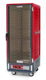 The Metro C539-HXFC-UA is a red, full-height commercial food warmer cabinet on wheels with a clear door that reveals metal shelves. It has universal wire slides, control dials, and indicators at the bottom front.
