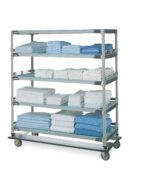 The Metro LXH56CX3 MetroMax Linen Exchange/Transport Cart holds towels in blue and white shades on four shelves, organized in stacks folded both lengthwise and widthwise.