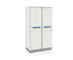 The Metro SXRD72TU5 Starsys Stationary Supply Cabinet has white, closed double doors with blue rectangular handles and horizontal lines. It stands on a gray base, elegantly complementing any setting against a plain white background.
