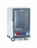 The Metro C515-CXFC-4 C5 1 Series Holding/Proofing Cabinet is a 1/2 height mobile heated unit with fixed wire slides, featuring a glass door, metal body, ventilation slots, and control panel. It operates at 220-240V and 1681-2000W, making it ideal for food warming and transport at 50/60Hz.