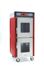 The Metro C549-ASDC-U C5 4 Series Insulated Holding Cabinet, full height with Dutch clear doors and Universal Wire Slides, features a red and silver finish, operates on 120V/60Hz/1400W, includes control knobs on its panel, has vented panels, and is mounted on wheels for easy mobility.