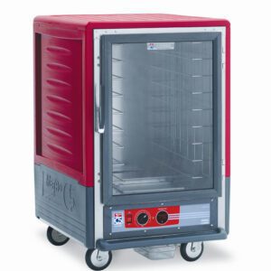 The Metro C535-HLFC-4A C5 3 Series insulated holding cabinet is a 1/2 height unit with a full-length clear door outlined in red. It has fixed wire slides, multiple shelves, and bottom dials, runs on 120V power at 1440W, and features wheels for easy transport.