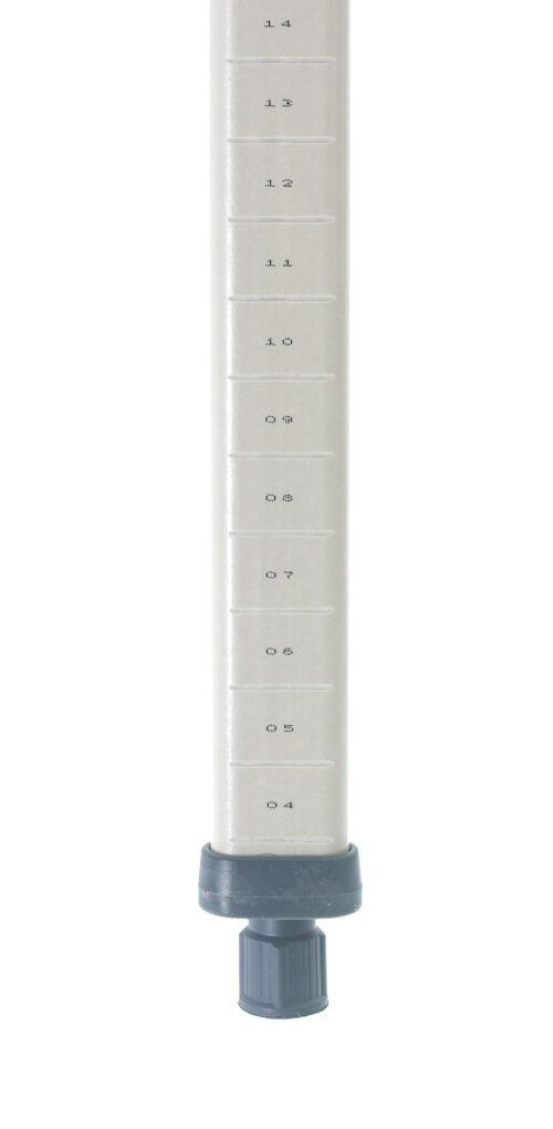 Close-up of a gray and white measuring tool with a black base, resembling the sleek MetroMax MX27P Industrial Shelving Post, Polymer, 27 H. Featuring increments from 0.1 to 1.0, it stands vertically against a plain white background.