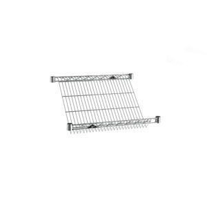 The Metro 1824DNC Super Erecta Slanted Shelf (18 x 24) is a wall-mounted, chrome-plated rack with a sleek design of evenly spaced bars, ideal for draining and drying dishes while enhancing modern kitchen décor.