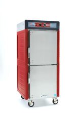 The Metro C549-ASDS-LA C5 4 Series is a full-height insulated holding cabinet in red and silver, featuring Dutch solid doors, top control knobs, four caster wheels for stability, and runs on 120V power with lip load aluminum slides for optimal storage.