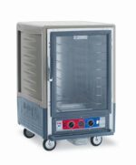 The Metro C535-CLFC-4-GYA is a mobile, half-height insulated holding/proofing cabinet with a full-length clear door, fixed wire slides, and red/blue controls. It features a gray and blue design, rests on four wheels for easy transport, and operates on 120V at 60Hz with 1440W power.