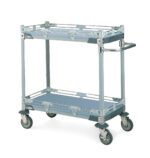 The Metro CHEMX3 MetroMax i Chemical Lab Cart is ideal for labs, featuring a gray metal design with two reinforced shelves, four swiveling rubber wheels, and a handle for easy maneuvering, making it perfect for transporting items in industrial or commercial settings.