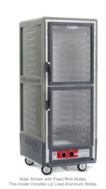 The Metro C539-HDC-L-GYA is a full-height insulated holding cabinet with Dutch Clear Doors, featuring clear hinged designs, multiple wire slides, a 60Hz digital control panel at the bottom, and lip load aluminum slides for smooth operation.