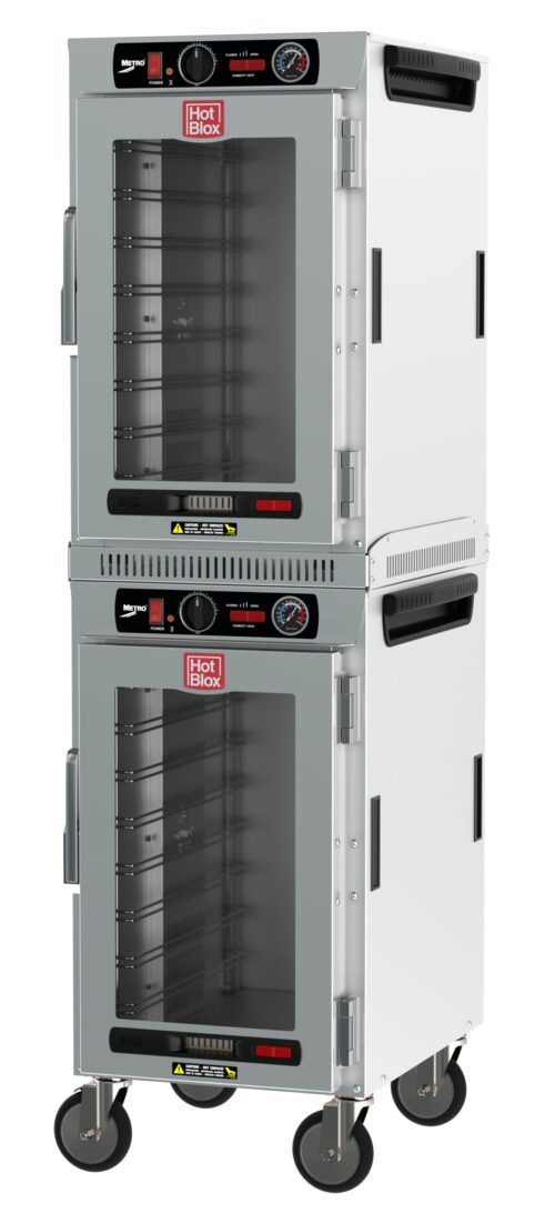 The Metro HBCN16-AC-M HotBlox is a dual-cavity, mobile holding cabinet featuring two narrow 16-pan stainless steel units, each with a clear door and analog controls. Its NEMA 5-15P compatible for kitchens operating at 60Hz.