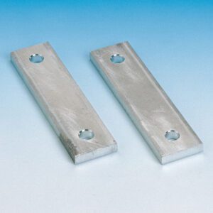 The Metro TTSTP Top-Track Stop Plate Kit consists of two brushed metal rectangles, each with a circular hole near the ends, set against a blue-to-white gradient background.