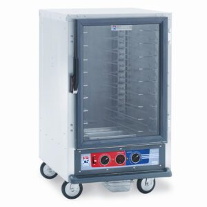 The Metro C515-PXFC-UA C5 1 Series Proofing Cabinet features a sleek frame, a transparent door, universal wire slides for multiple shelves, front control dials for easy operation, and smooth mobility with wheels. Suitable for 50/60Hz environments at 220-240V and 1210-1440W.