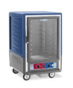 The Metro C535-CLFC-U-BU C5 3 Series Insulated Holding/Proofing Cabinet is a 1/2 height model with a full-length clear door, Universal Wire Slides, and a blue top. It features a 60Hz control panel at the bottom with knobs/switches and wheels for easy mobility.