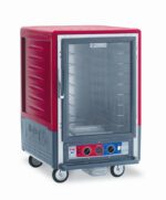 The Metro C535-CFC-4 C5 3 Series is a 1/2 height insulated food holding/proofing cabinet featuring a full-length clear door, fixed wire slides, caster wheels for easy mobility, control knobs on the lower front panel, and a convenient side handle. It operates at 120V, 60Hz, and 2000W power.