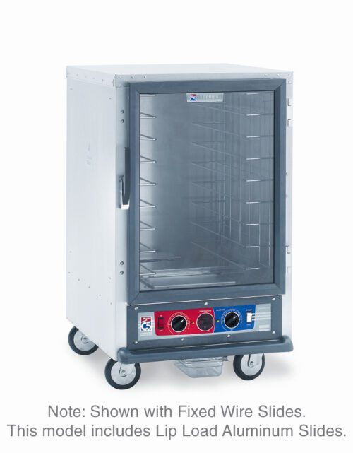 The Metro C515-CFC-L 1/2 Height Holding/Proofing Cabinet features a transparent door with multiple shelf slots, bottom control panel with knobs and buttons, and Fixed Wire Slides. This commercial 120V, 60Hz, and 2000W metal oven on wheels includes Lip Load Aluminum Slides.