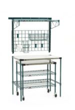 The Metro SMSPM2436 SmartWall/Super Erecta Prep Station with Undercounter Mobile Prep Cart offers convenience and efficiency, featuring three wire shelves, a tabletop, a top metal grid for organization, and four wheels for easy mobility.