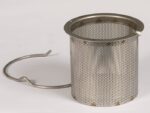 A Justrite Flame Arrester F/Disposal Can, with its metal mesh strainer and cylindrical shape, includes a detachable ring handle. It is elegantly displayed against a plain white background.