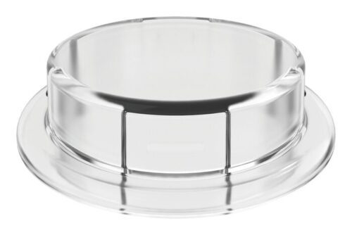 The Justrite Adapter is an 83mm clear plastic lid with a round design, flat top, and smooth edges. It features a recessed handle area for easy lifting and Closd design for a snug fit on matching containers.